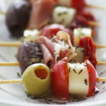 The olives and prosciutto give this snack lots of flavor.