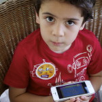 My little man watching a video about washing your hands.