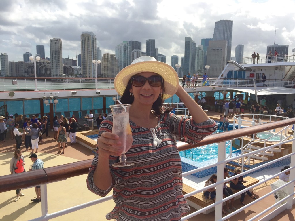 The Adonia's sail away party with the Miami skyline in the background.