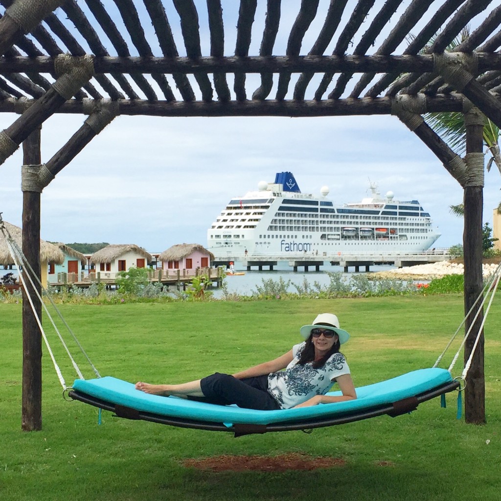 Relaxing at Amber Cove with Fathom's Adonia in the background.