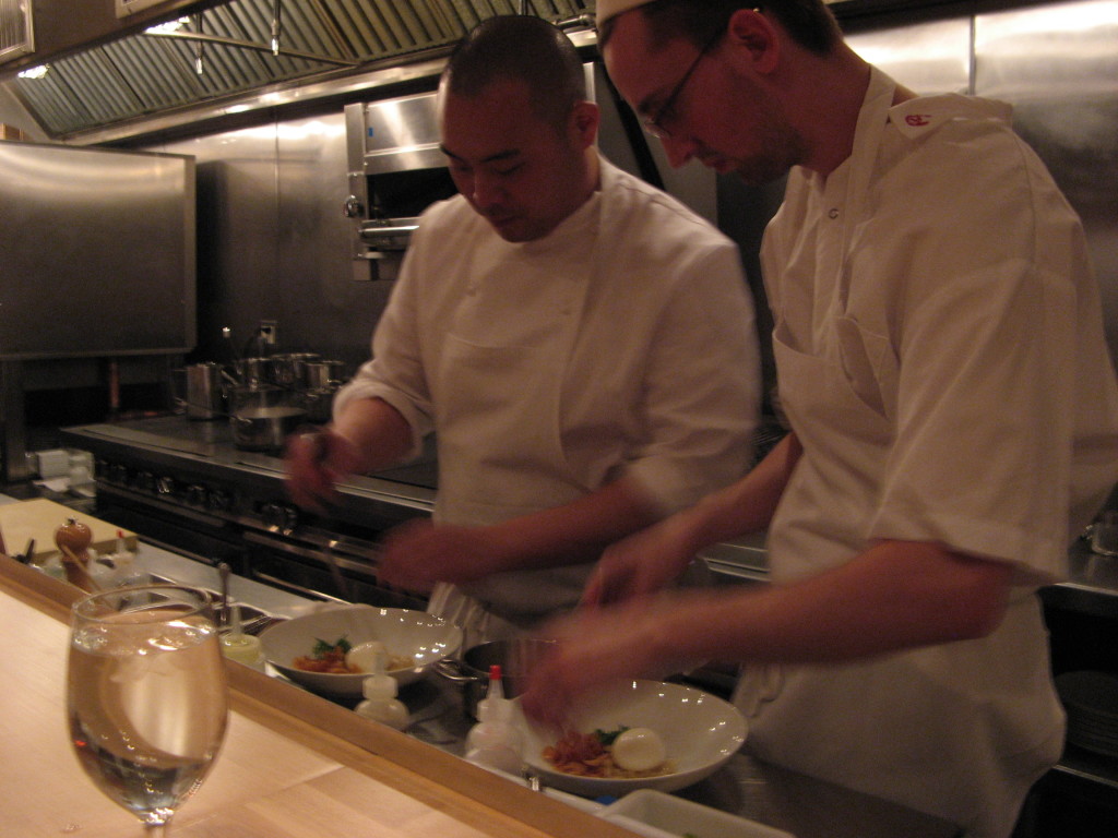 chefs cooks staff preparing food at Momofuku ko in Manhattan NYC