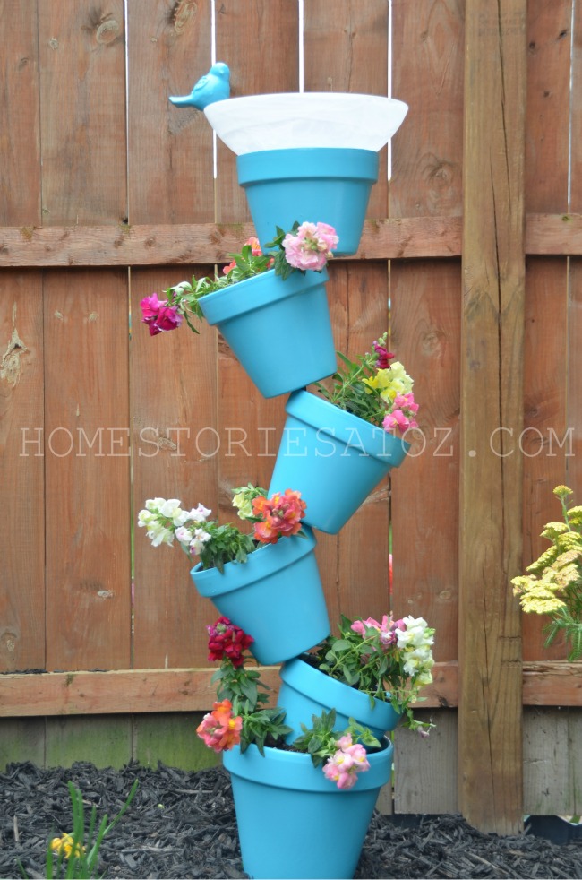 Topsy turvy terracotta vertical garden with bird bath. Photo: Home Stories A to Z. 