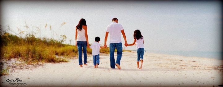 family walking on beach