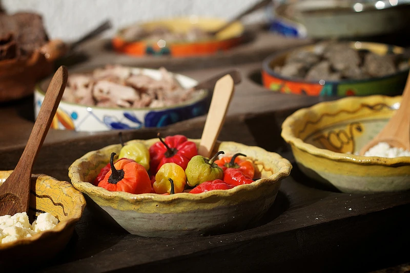 Fiambre divorciado with each ingredient served in its own dish