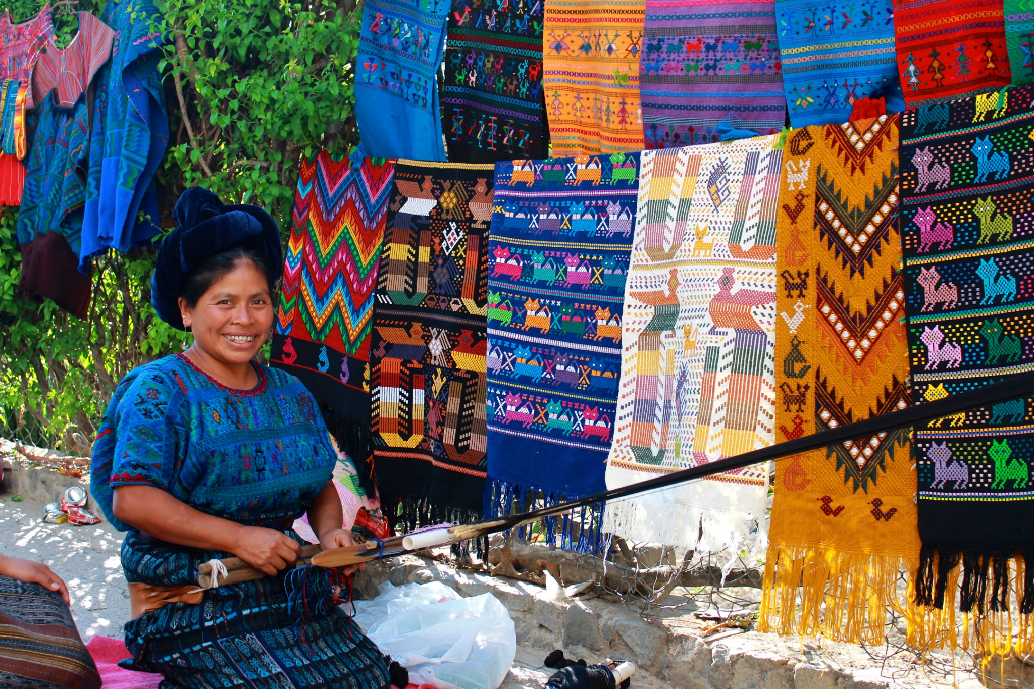 Woman weaving on a traditional backstrap loop in San Catarina Palopo