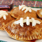 These Football chocolate strawberry empanadas with snickers are perfect for the big game party!