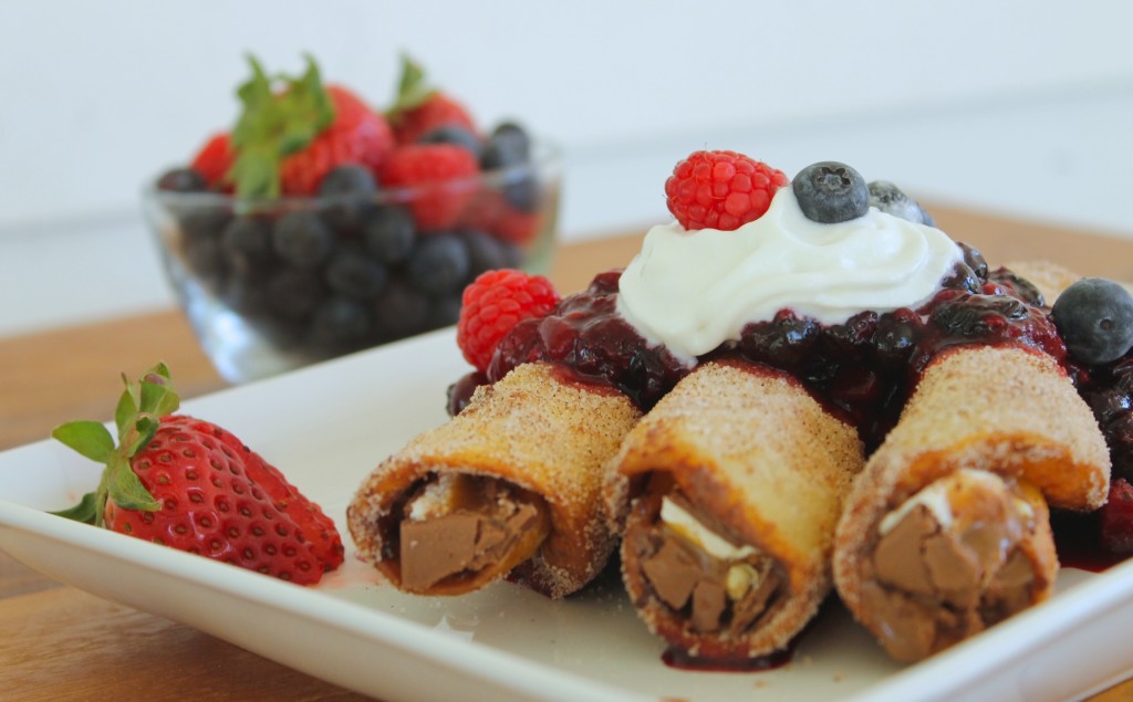 Chocolate tacos with berry sauce Snickers Almond