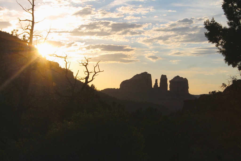 sunset behind red rocks in Sedona