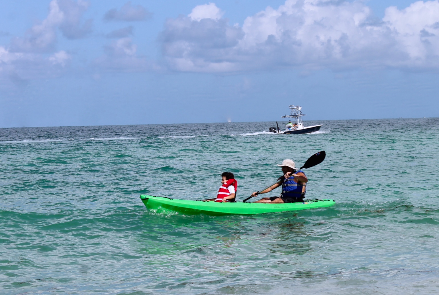 dad and son in kayak