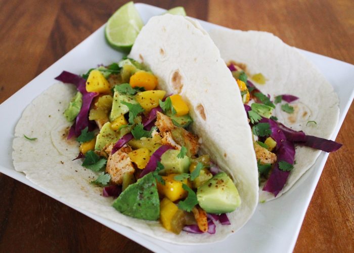 chipotle lime fish tacos with avocado and mango