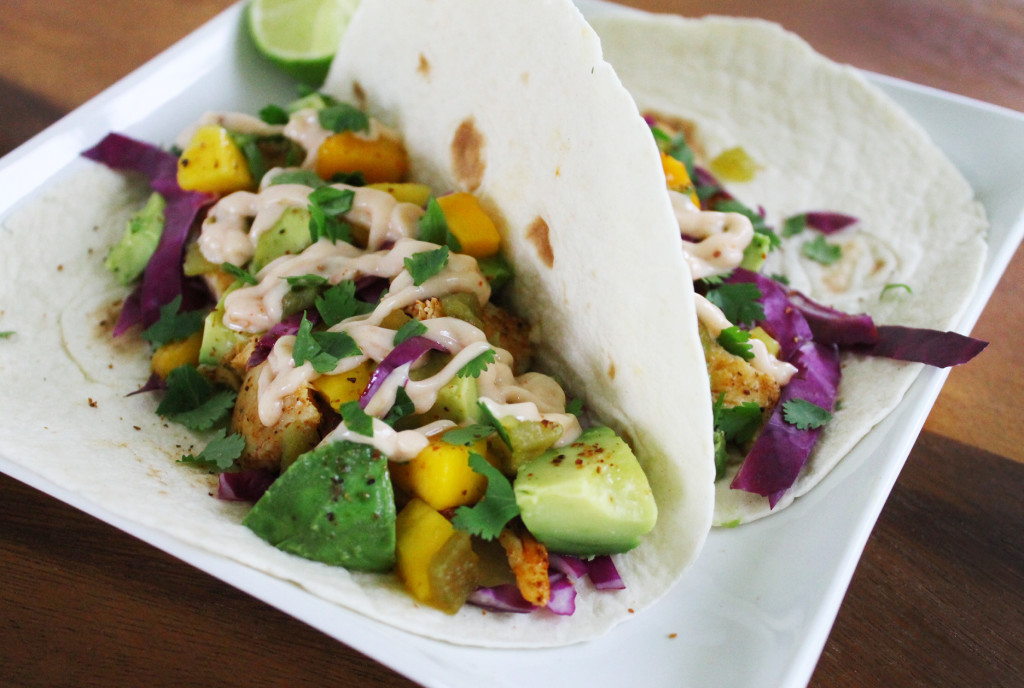chipotle lime fish tacos with avocado and mango