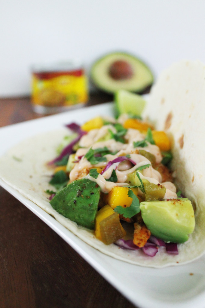 chipotle lime fish tacos with avocado and mango