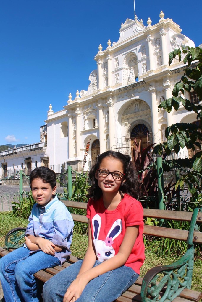 Central Park in Antigua Guatemala with the Cathedral in the background. 