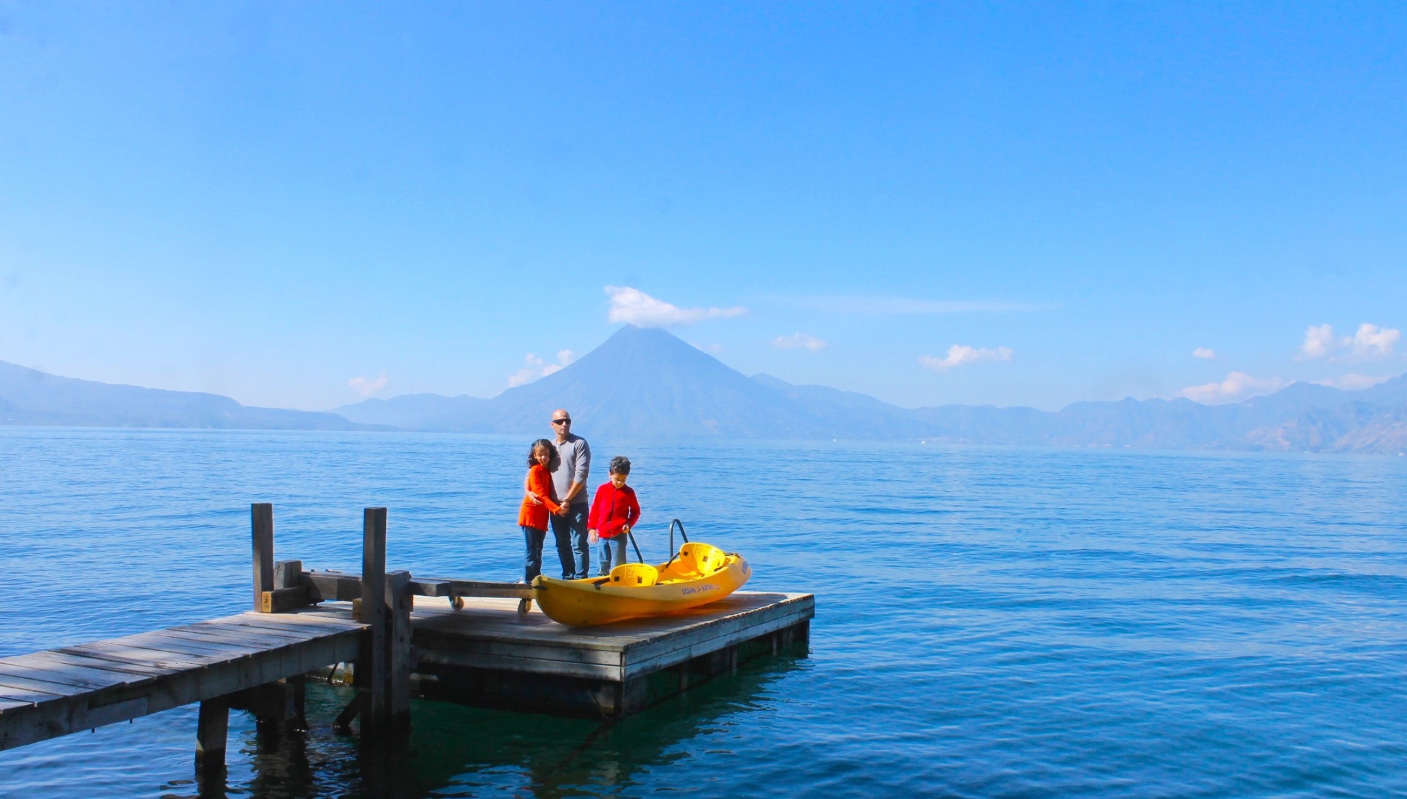 Father and children at Lake Atitlan in Guatemala