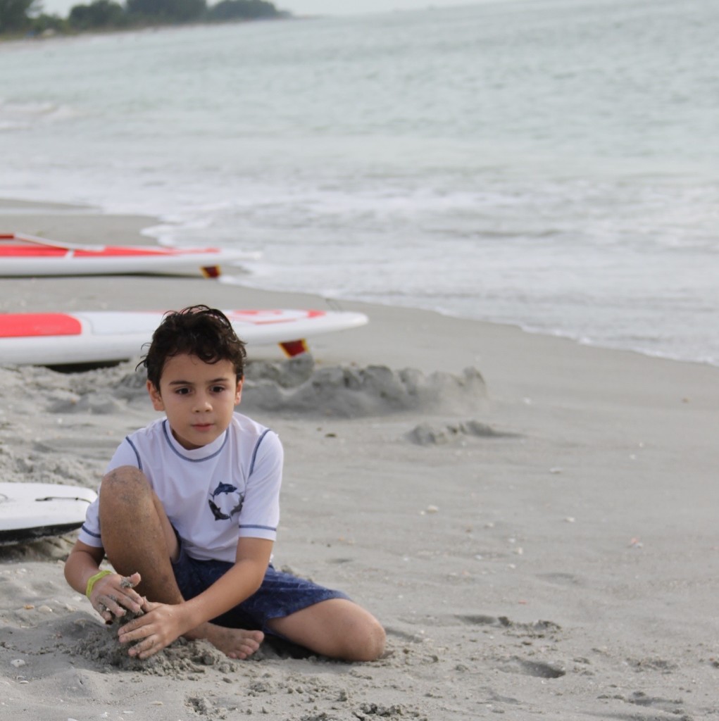 boy on Sanibel beach at South Seas Island Resort