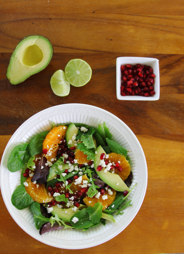 Avocado Tangerine salad with spicy vinaigrette top view