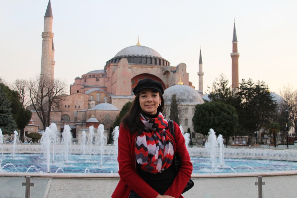 woman Standing in front of Haghia Sophia in the Sultanahmet district of Istanbul.