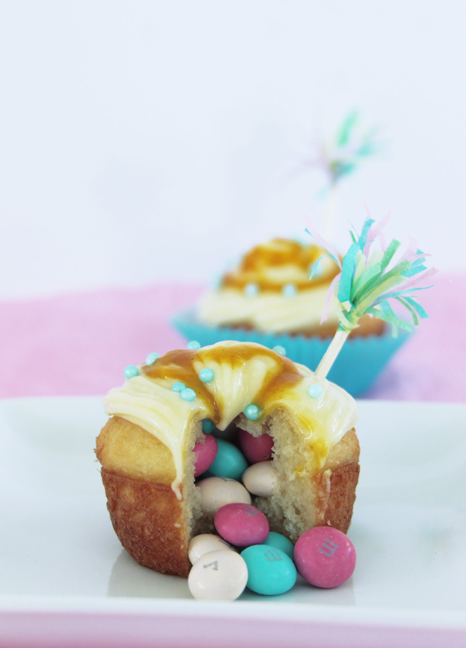 passion fruit piñata cupcakes