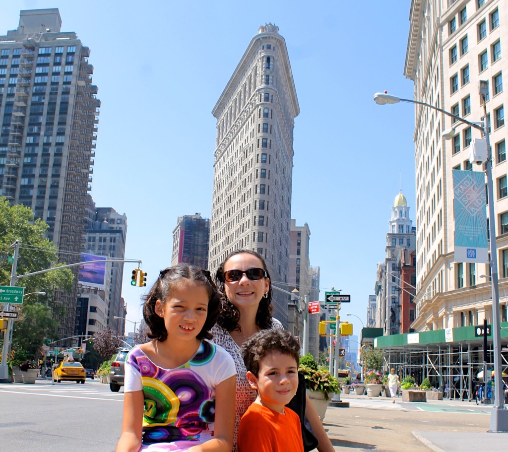 family in front of Flatiron building 