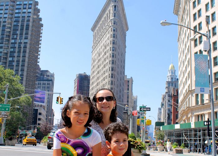 family in front of Flatiron building