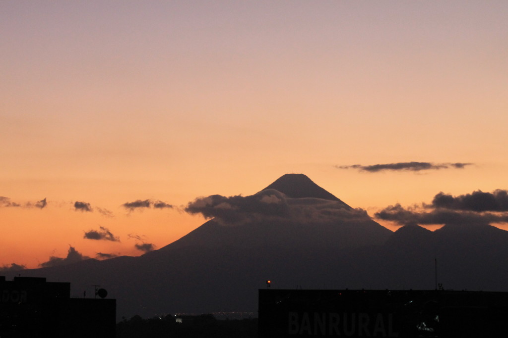 sunset behind volcano in Guatemala