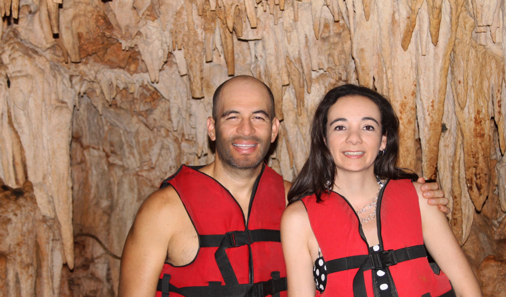 couple in vacation on a cave cave