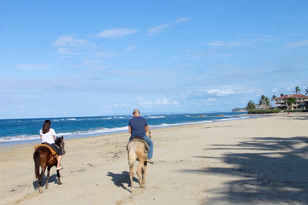 Riding horses on the beach in Puerto Plata Dominican Republic