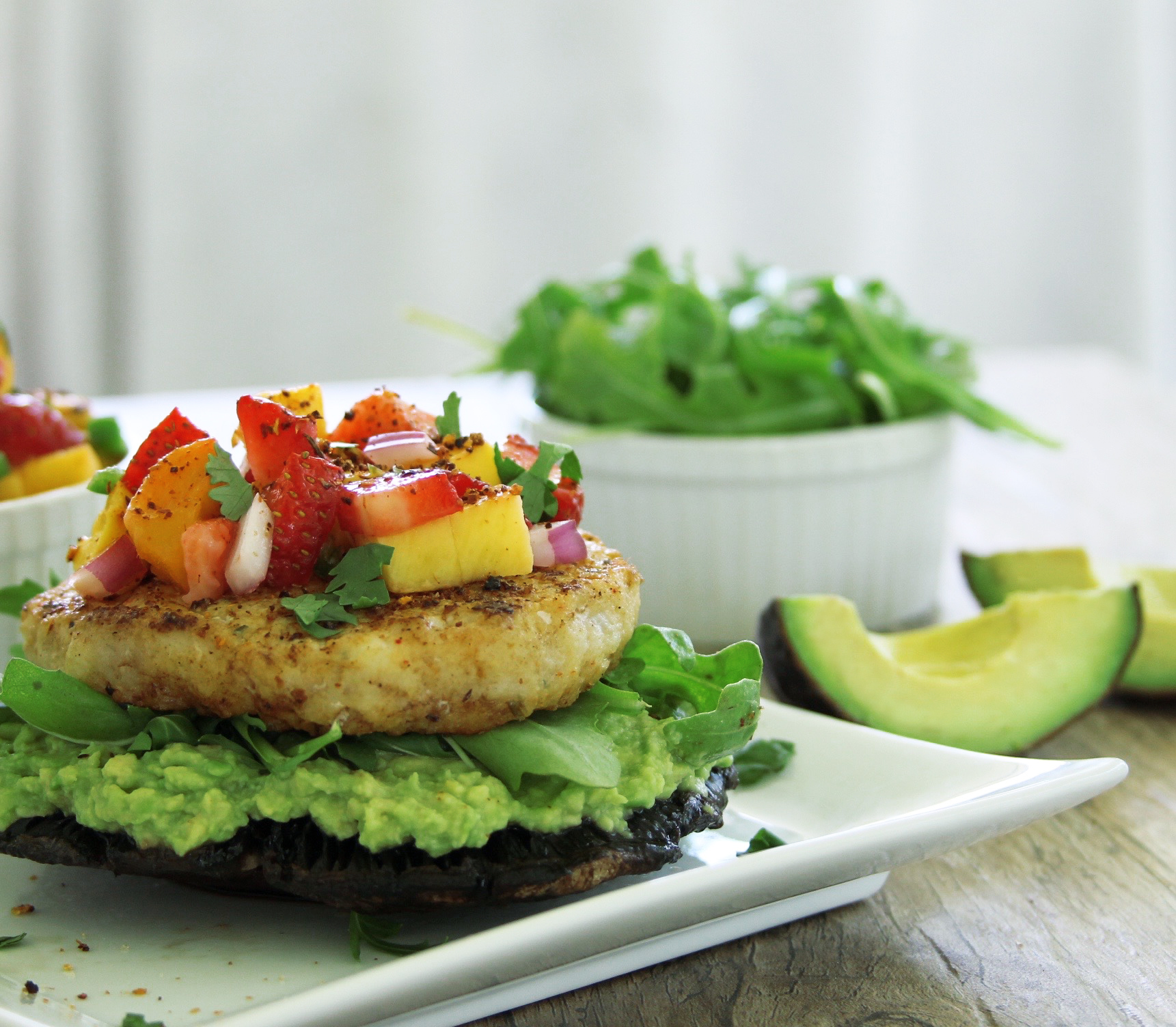 Portobello fish burger with avocado and strawberry mango salsa