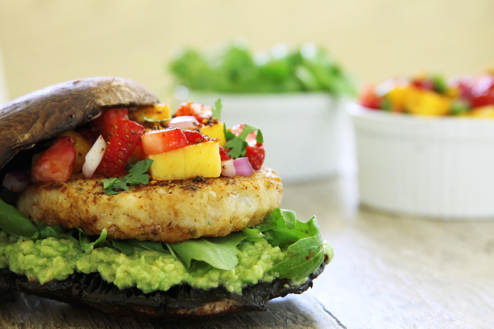 Portobello fish burger with avocado and strawberry mango salsa