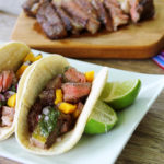 chipotle carne asada tacos with mango chimichurri