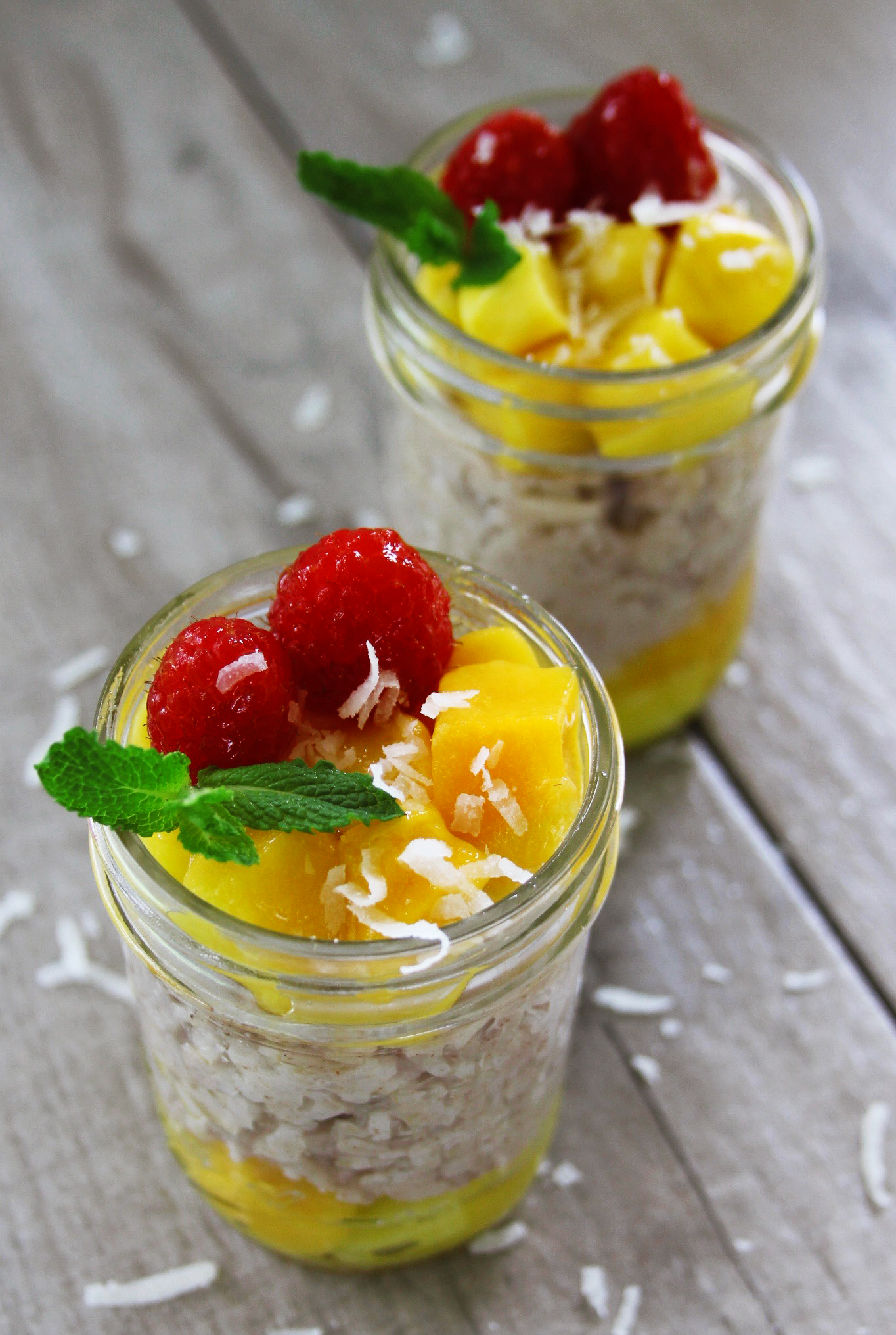 coconut and mango arroz con leche in a mason jar