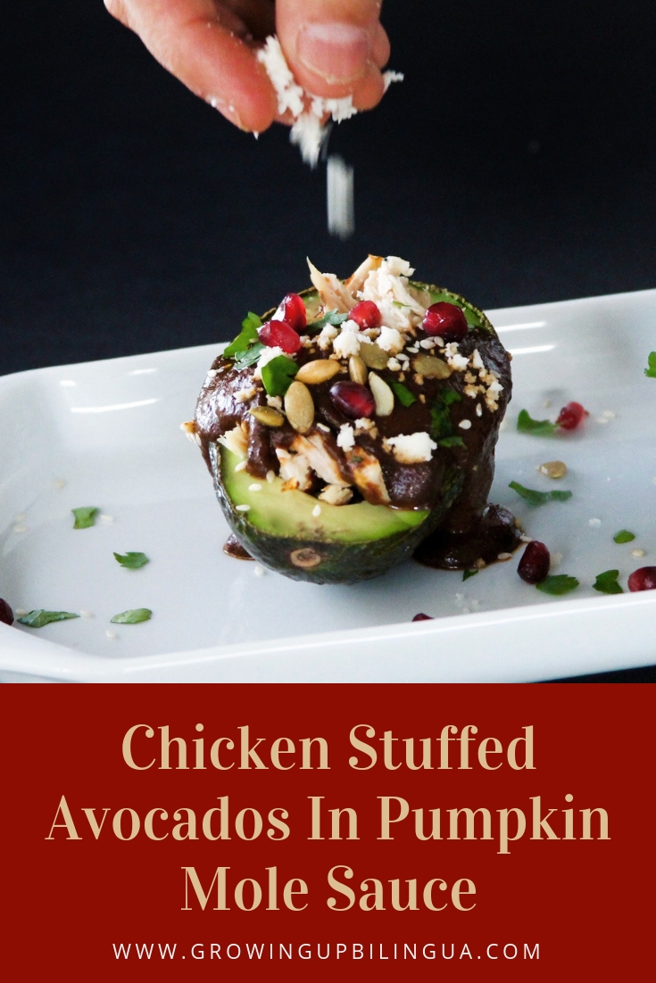 Chicken Stuffed Avocados In Pumpkin Mole Sauce