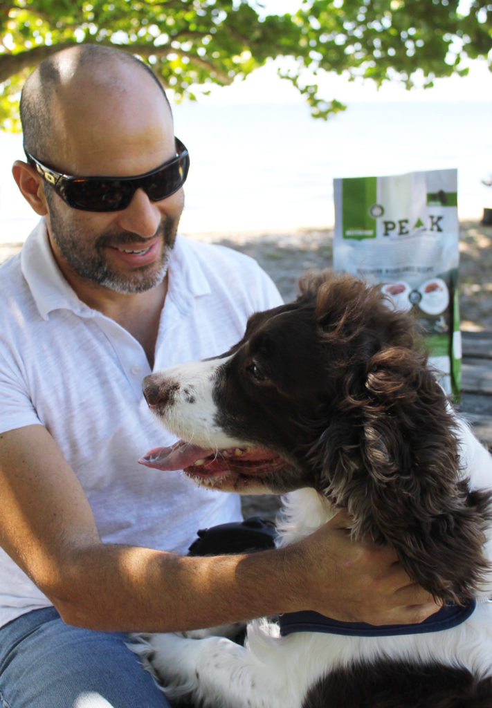 dog and owner outdoors with Rachael Ray Nutrish dog food