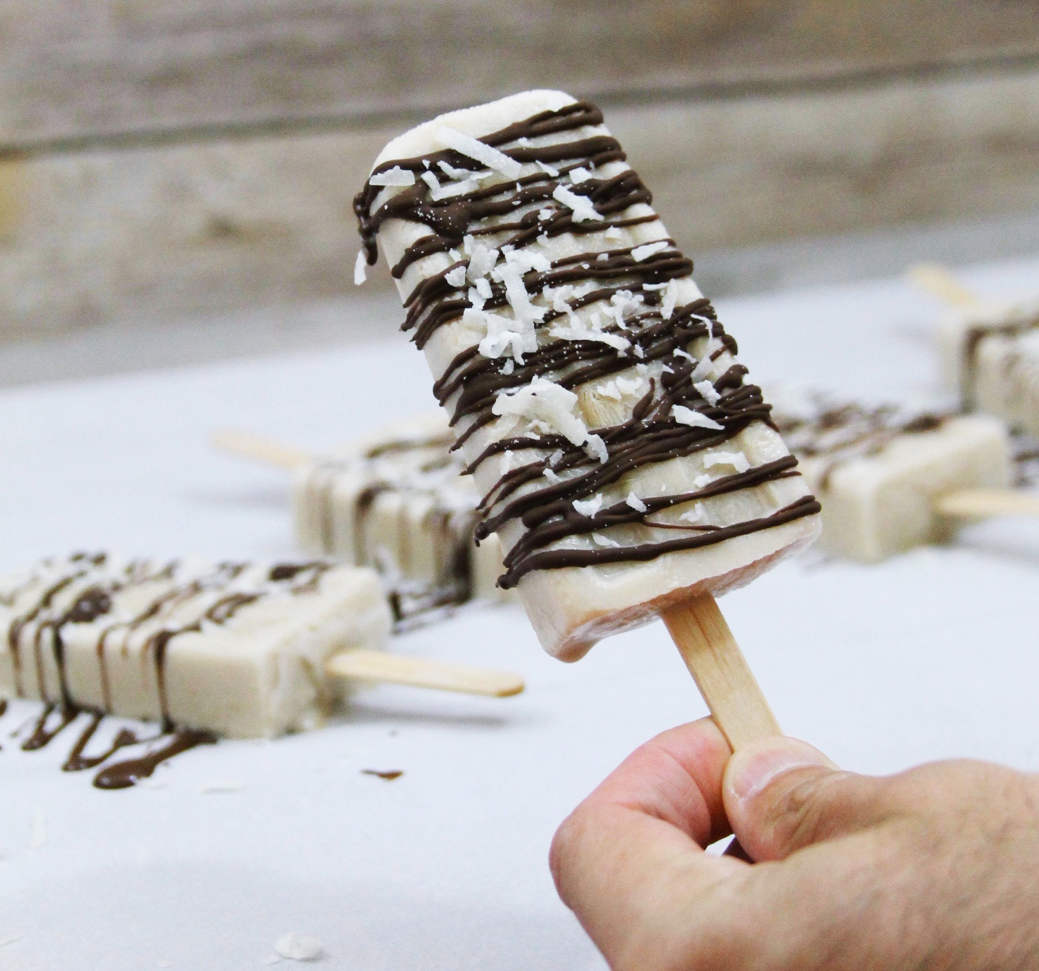 Caramel Latte Popsicles With Coconut And Chocolate Drizzle