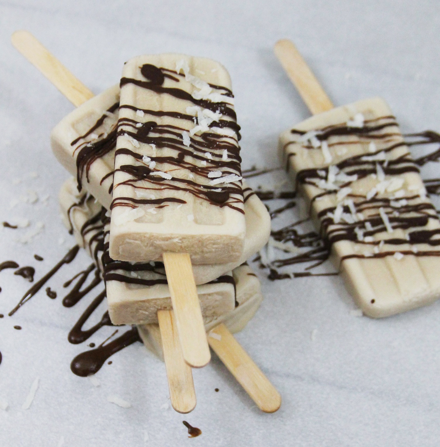 Caramel Latte Popsicles With Coconut And Chocolate Drizzle