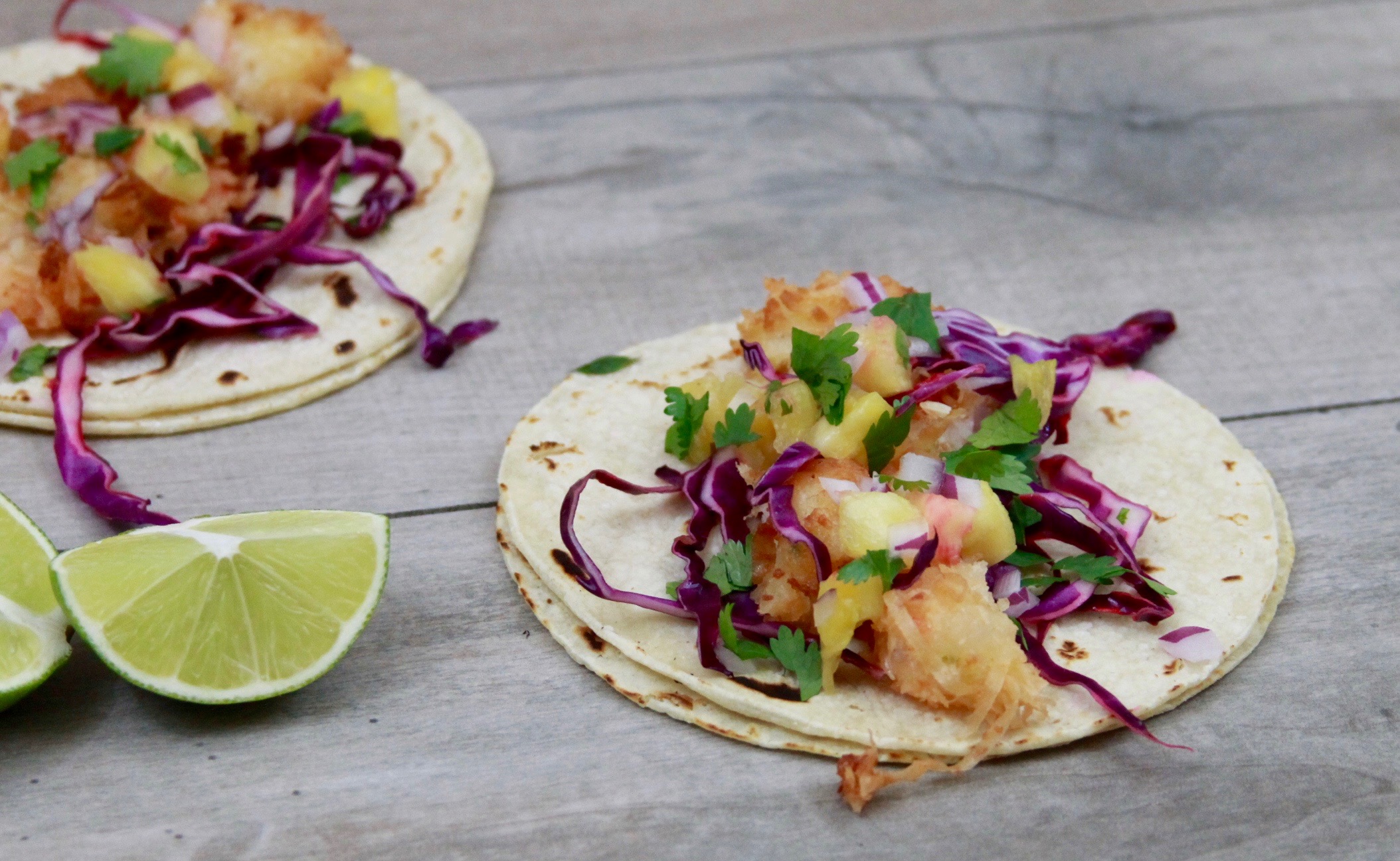 Coconut shrimp tacos with pineapple slaw