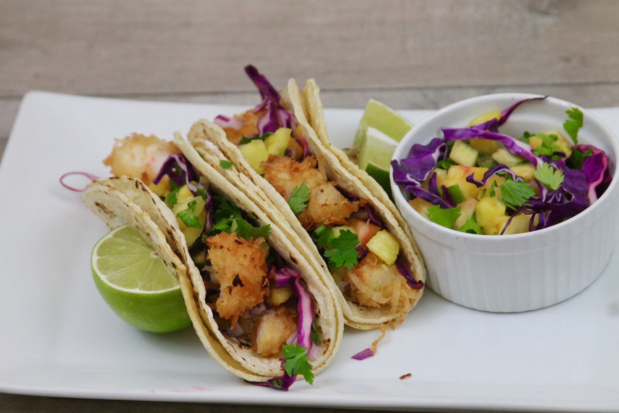 Coconut shrimp tacos with pineapple slaw