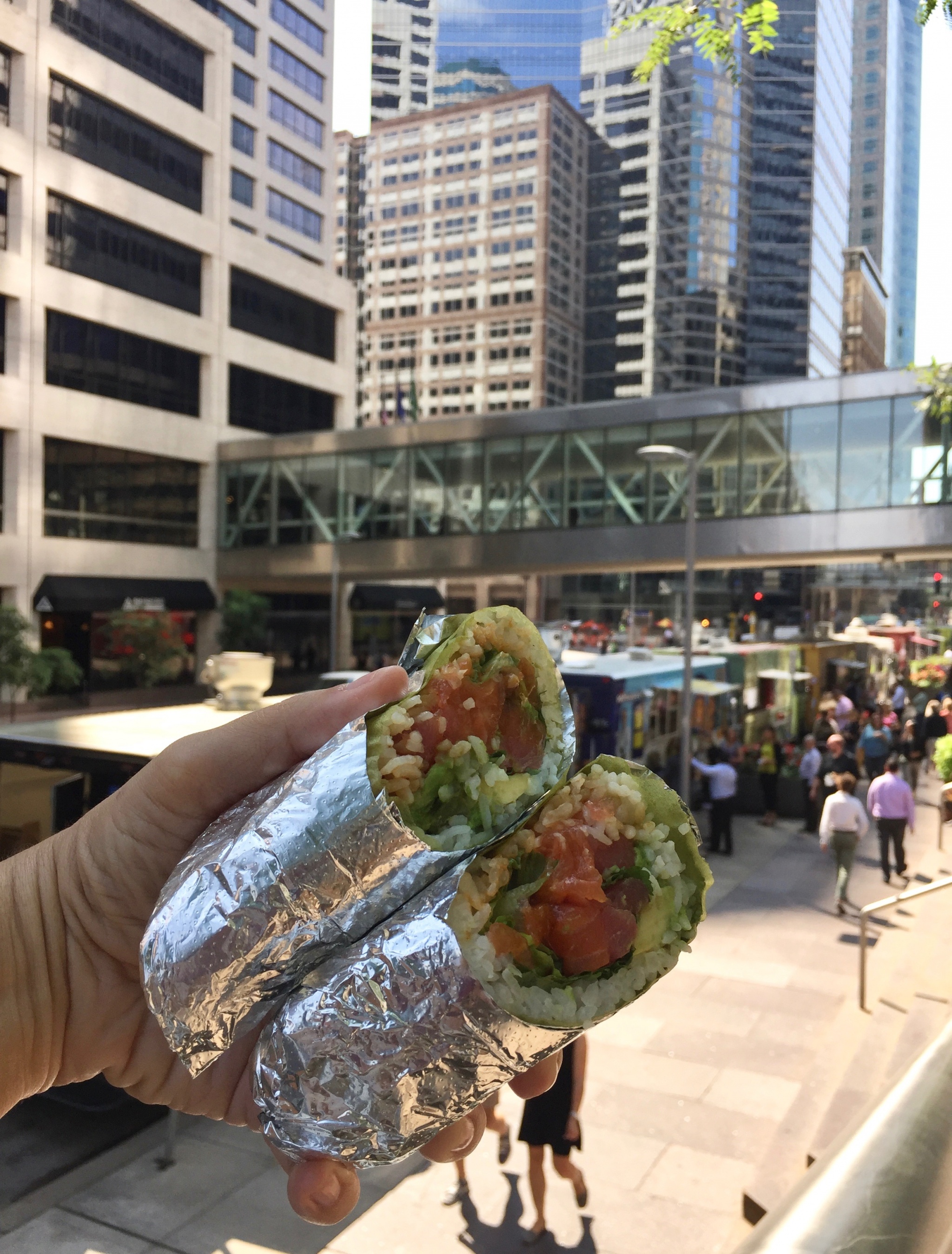 Food truck scene in Minneapolis with sushi burritos in the foreground