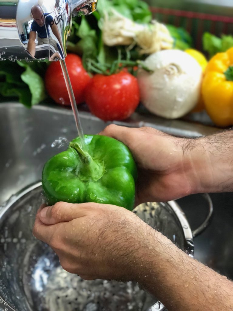 washing vegetables with PUR water filter
