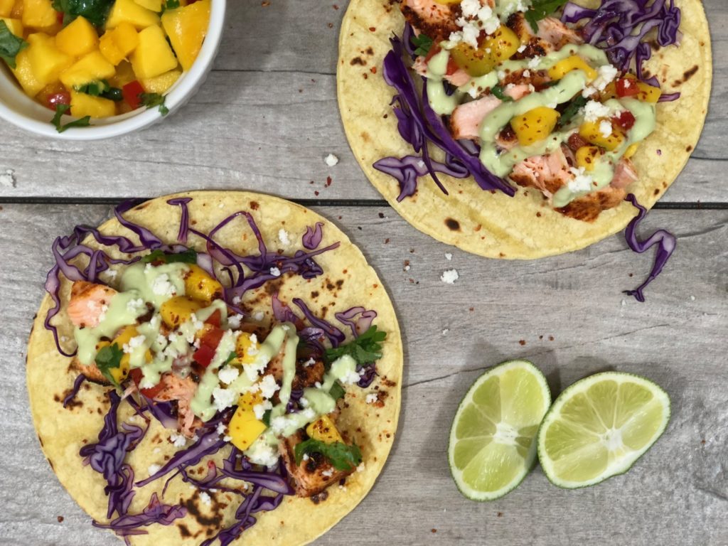 Chipotle Salmon Tacos With Mango Salsa And Avocado Crema