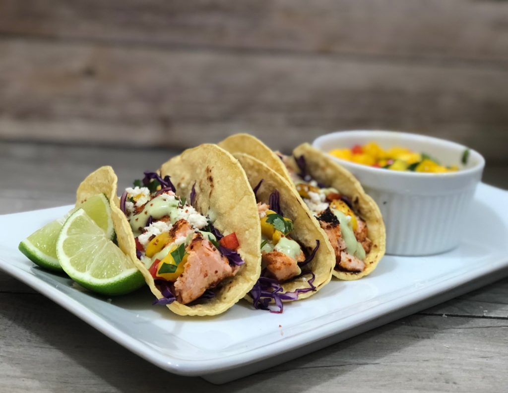 Chipotle Salmon Tacos With Mango Salsa And Avocado Crema