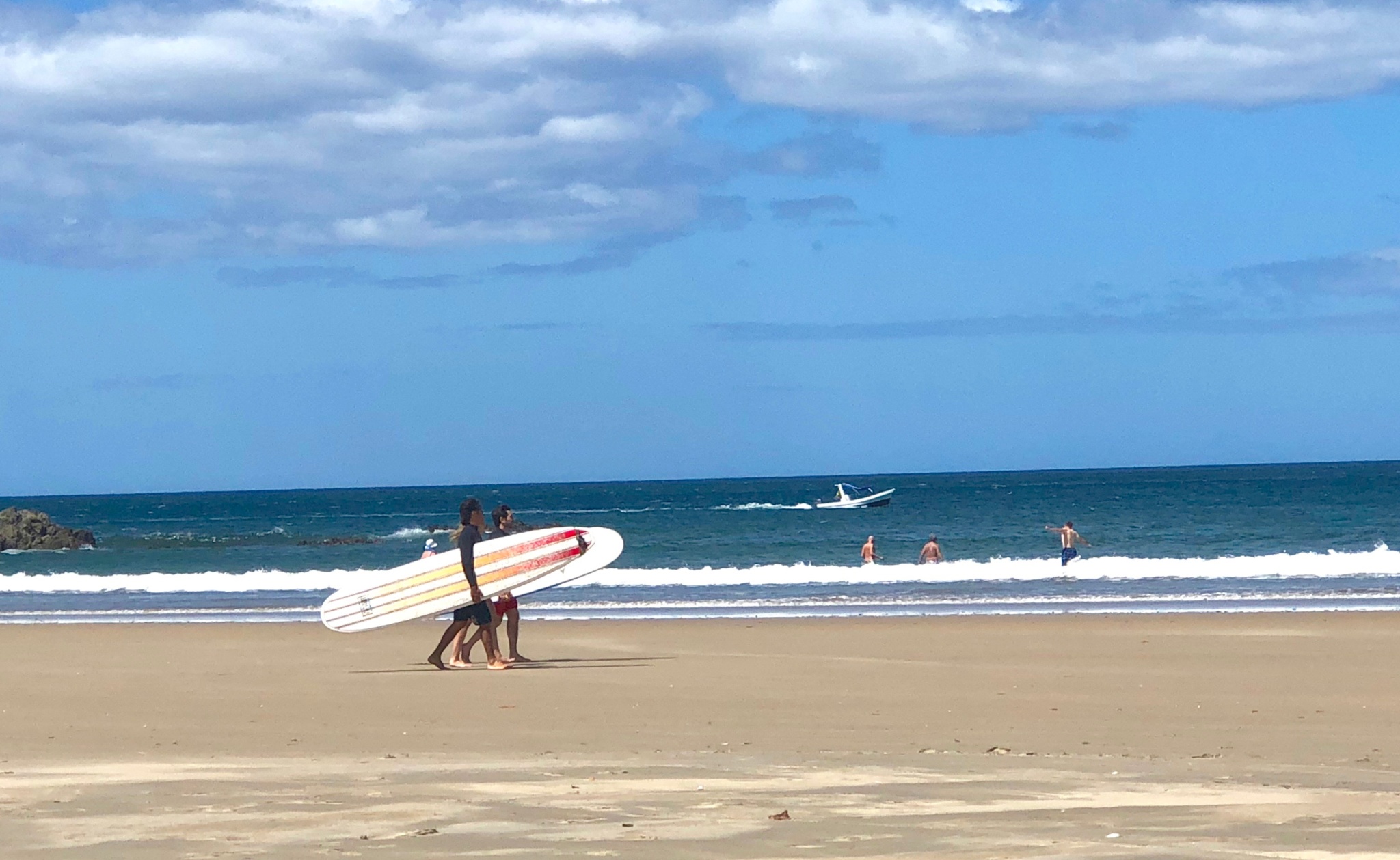 surfers in Tamarindo Beach Costa Rica