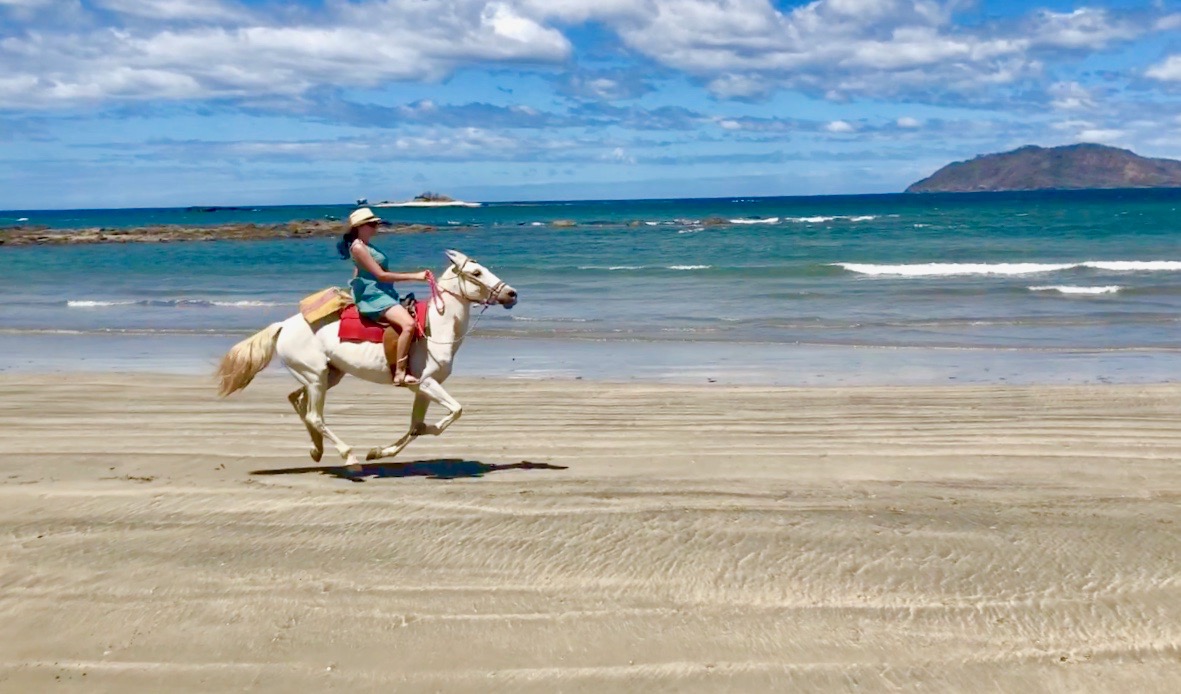 Horseback riding on the beach in Costa Rica
