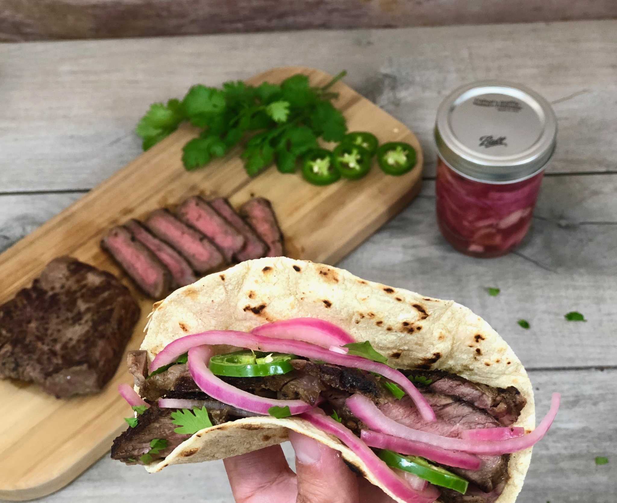 grilled skirt steak tacos with pickled onions