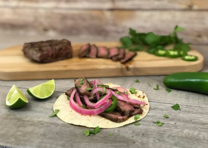 grilled skirt steak tacos with pickled onions