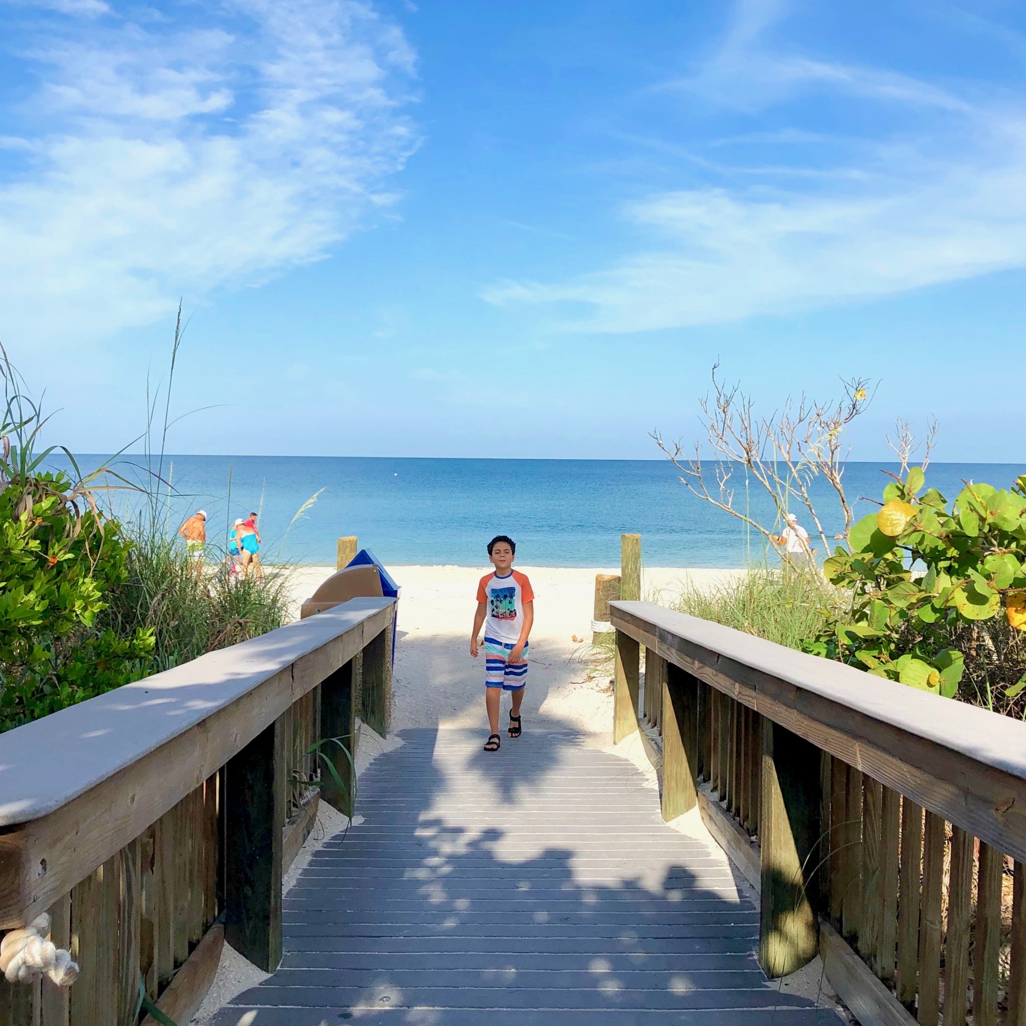 boy arriving at the beach