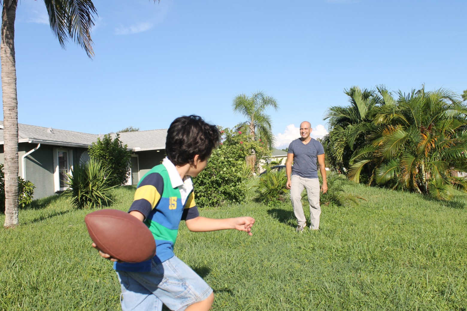throwing football with dad