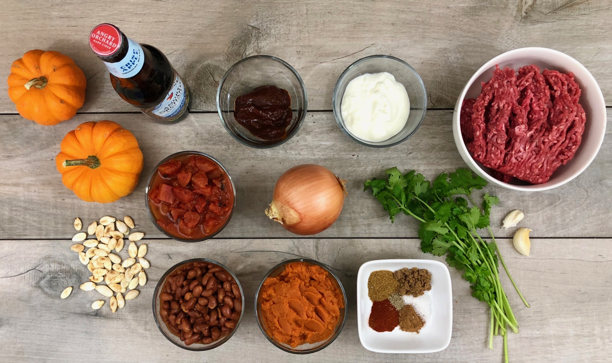 This chipotle beef pumpkin chili takes chili to a whole new level with its subtle sweetness and smoky heat for a fall dish that is sure to become this season's favorite slow cooker chili recipe.