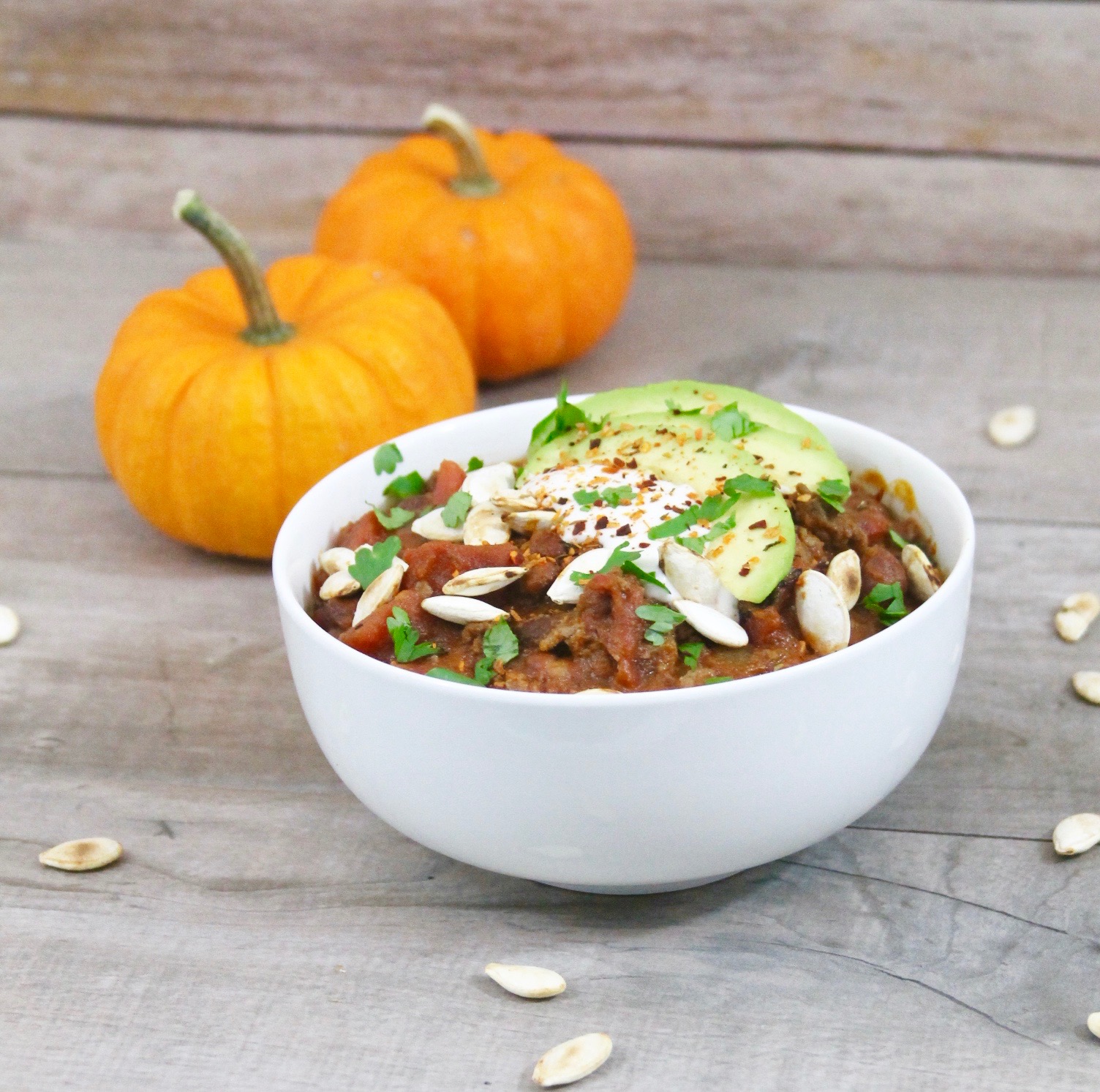 This chipotle beef pumpkin chili takes chili to a whole new level with its subtle sweetness and smoky heat for a fall dish that is sure to become this season's favorite slow cooker chili recipe.