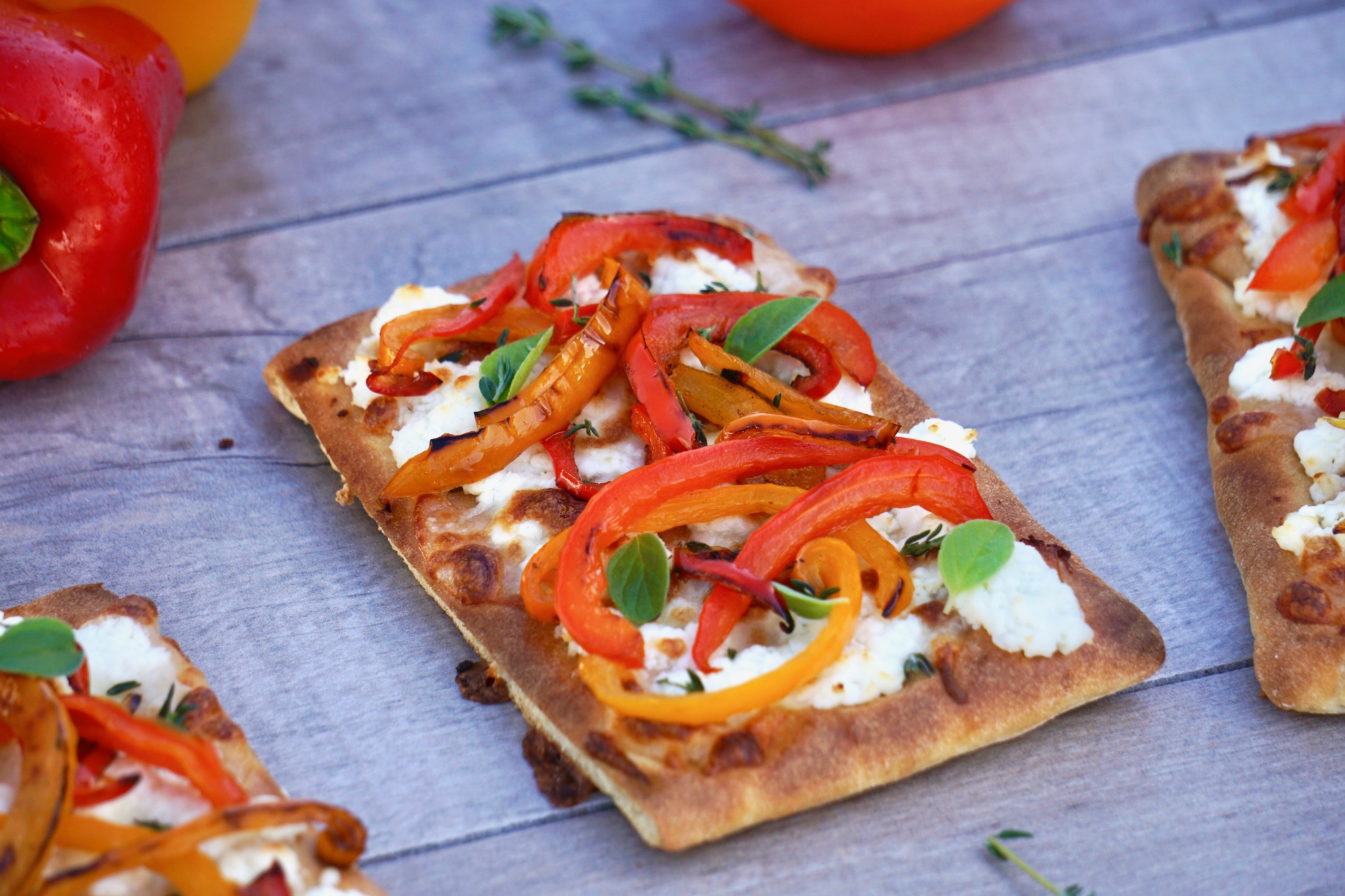Bell pepper and goat cheese flatbread pizza